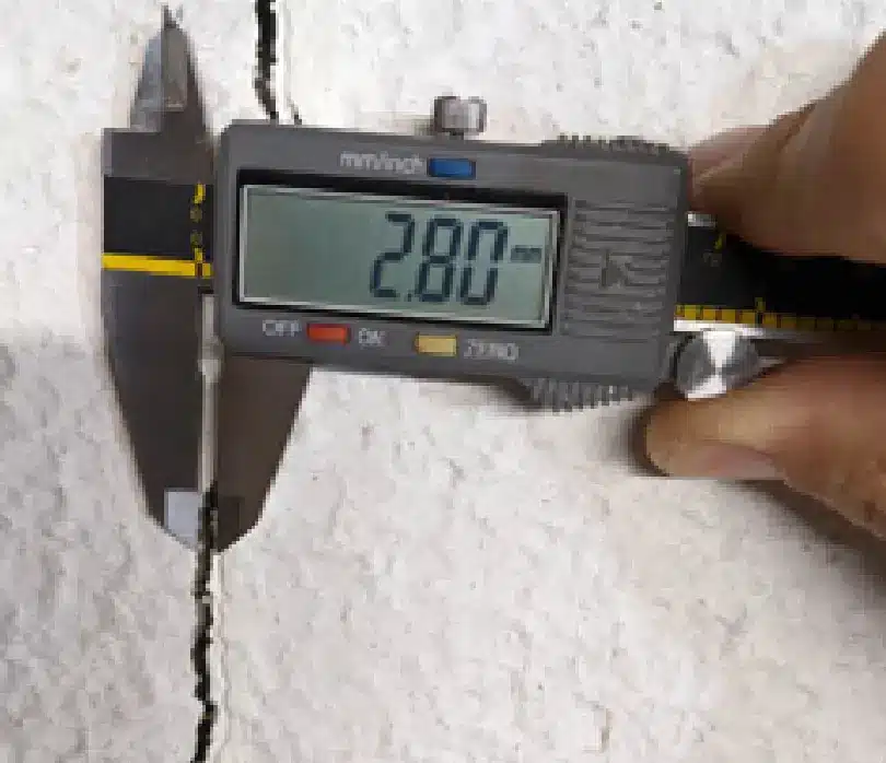 Wide foundation wall crack in an industrial concrete structure in Southeast Michigan