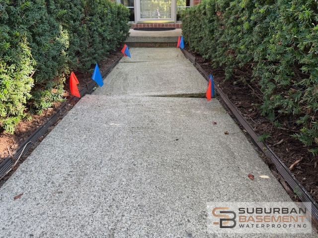 Before concrete leveling - sunken walkway Rochester Hills Michigan