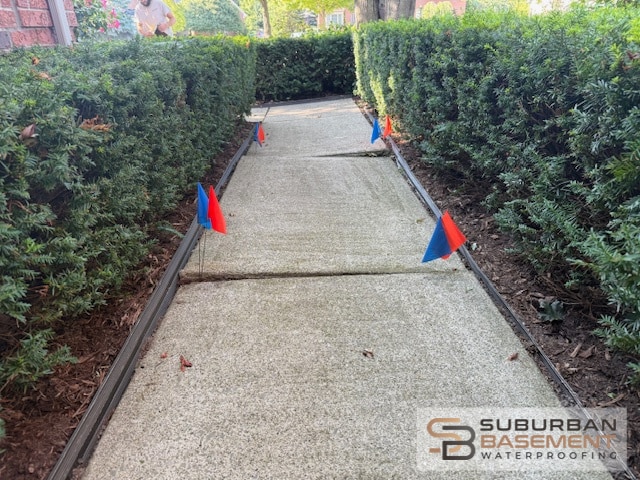 Before polyjacking - uneven slab and trip hazard Southeastern Michigan