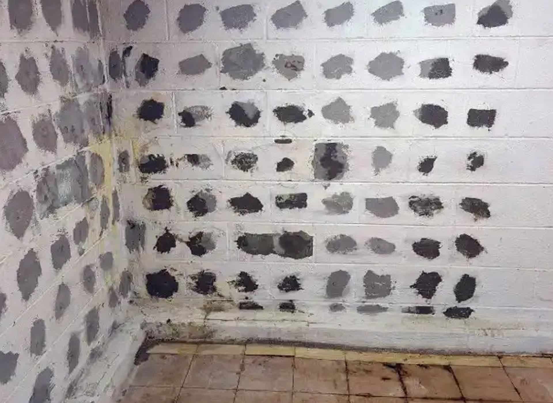Foundation wall in Mt. Clemens repaired from the exterior by block filling the cavities and curtain grouting through the wall, encapsulating the outside with foam