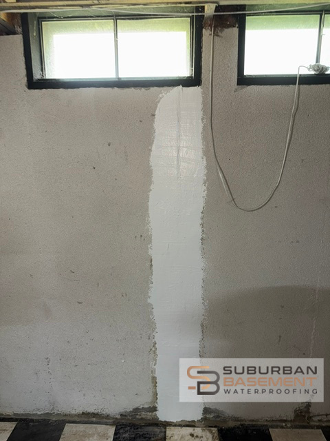Foundation crack repair finished product - Suburban Basement