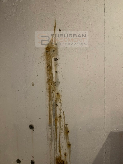 Foam and injection ports removed after a water test confirmed the crack was sealed, Bloomfield Hills, Michigan