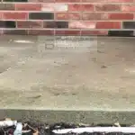 Concrete front porch slab in Warren MI after void filling and concrete leveling