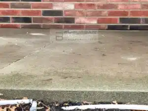 Concrete front porch slab in Warren MI after void filling and concrete leveling