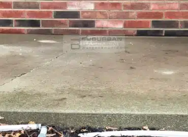 Concrete front porch slab in Warren MI after void filling and concrete leveling